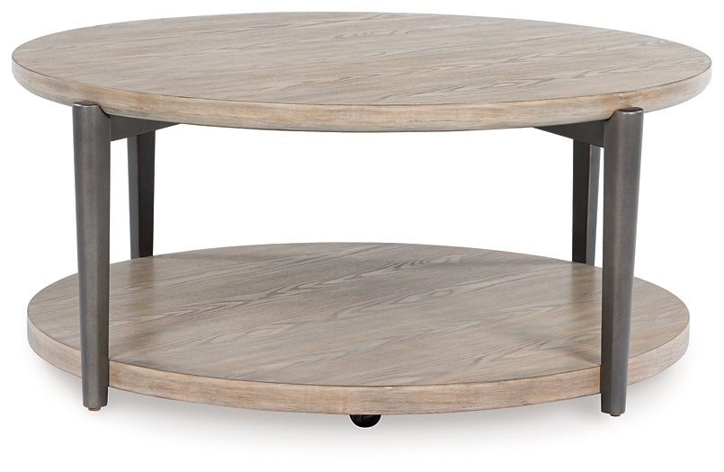 Dyonton Round Cocktail Table