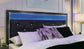 Kaydell Queen Upholstered Panel Storage Bed with Mirrored Dresser, Chest and 2 Nightstands Wilson Furniture (OH)  in Bridgeport, Ohio. Serving Bridgeport, Yorkville, Bellaire, & Avondale